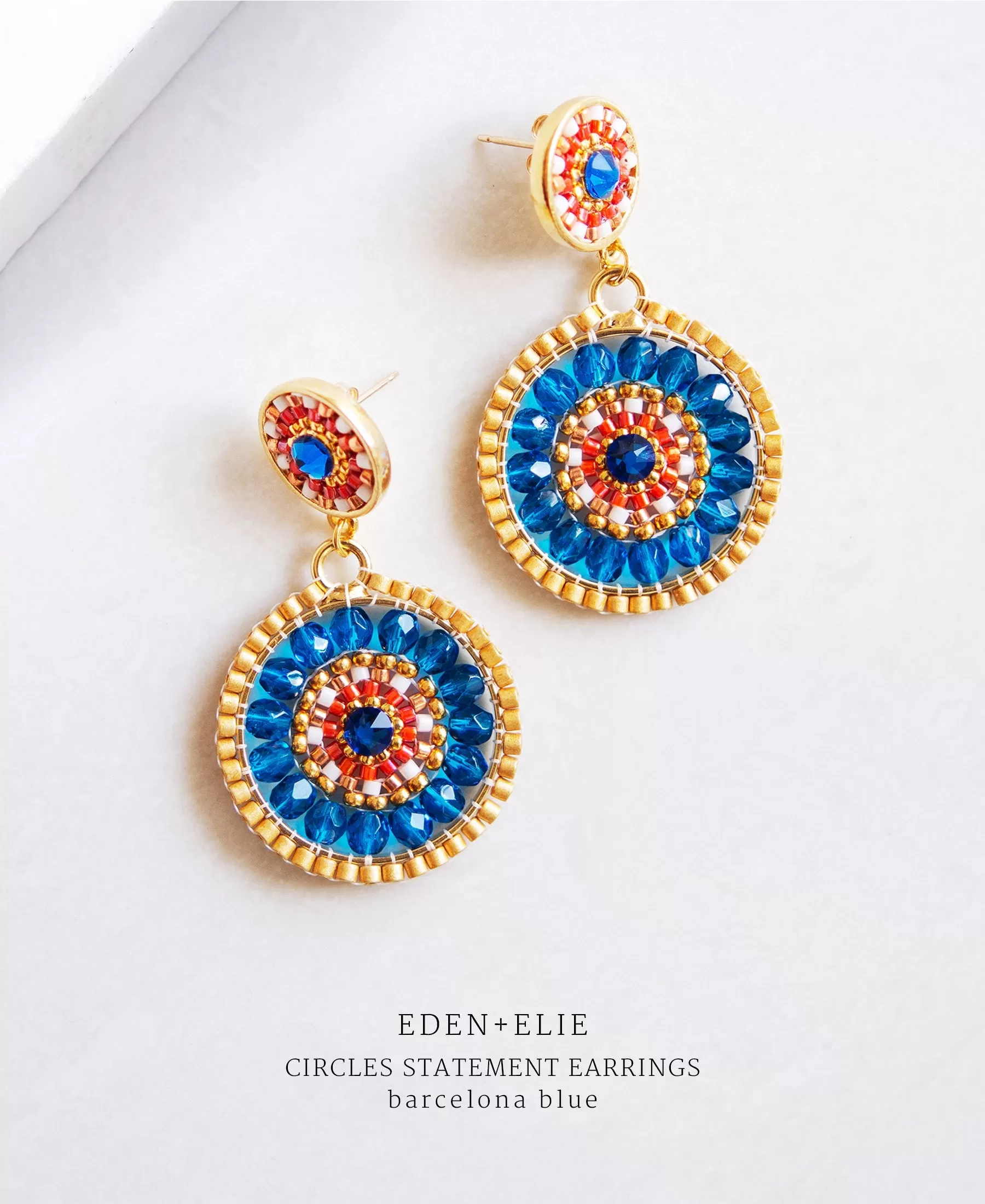 EDEN   ELIE double circle statement drop earrings - barcelona blue