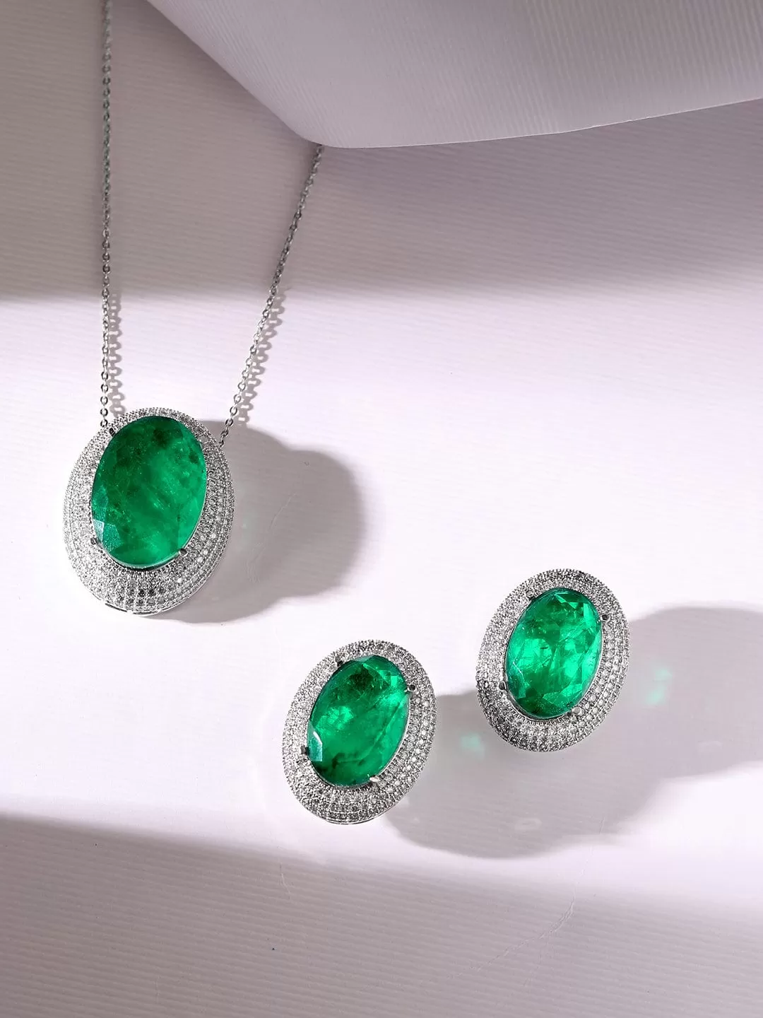 Rubans Rhodium Plated Zircons & Emerald Stone Studded Statement Pendant Set